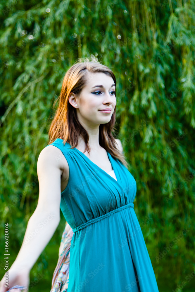 Happy Beautiful Girl Smiling in a Park Happy Beautiful Girl Smiling in a Park