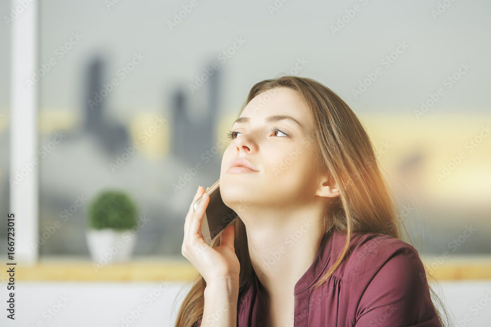 Young european woman on the phone