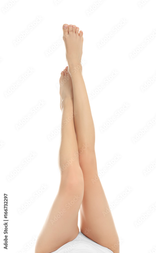 Epilation concept. Legs of beautiful young woman on white background Epilation concept. Legs of beautiful young woman on white background