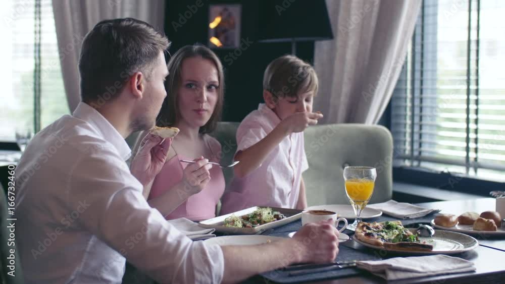 Eating family in a cafe Eating family in a cafe