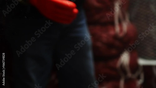 Workers move large bags of freshly caught shrimp