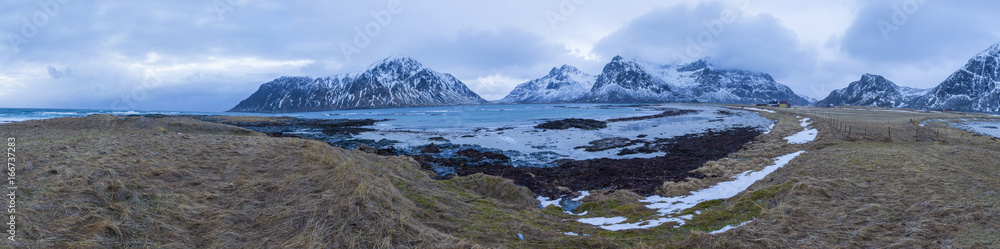 Travel Concepts, Ideas and Destinations. Panoramic View of Beautiful Stony Haukland Utaklev Beach at Lofoten Islands in Northern part of Norway.