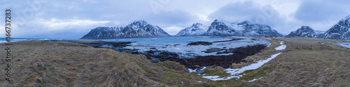 Travel Concepts, Ideas and Destinations. Panoramic View of Beautiful Stony Haukland Utaklev Beach at Lofoten Islands in Northern part of Norway.