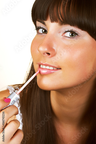 Close-up woman gloss lips