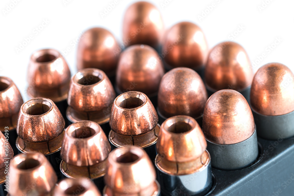 .45 Pistol bullets in a cartridge holder. .45 Pistol bullets in a cartridge holder.