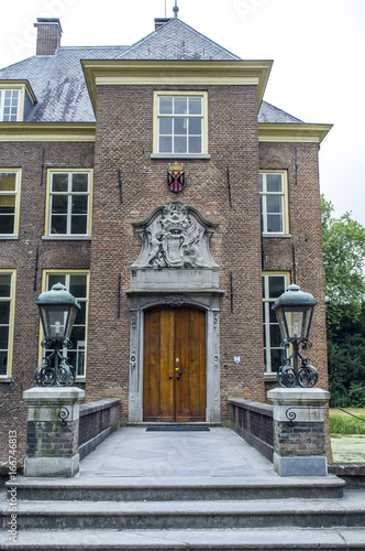 Exterior of castle Landgoed Waardenburg and Neerijnen in South Holland - The Netherlands - Europe photo