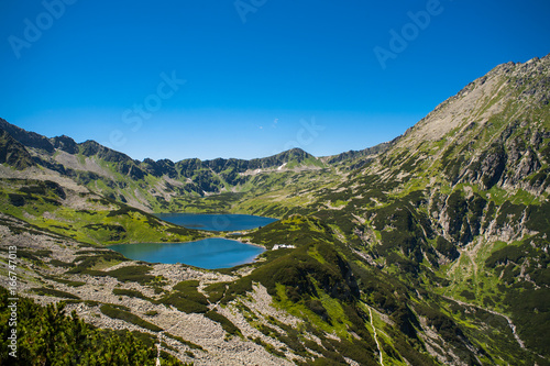 Tatras mountains, Valley of five ponds. View on mountains and two lakes. Trail to see eye from the mountain hostel in five ponds. Five breathtaking mountain lakes in the High Tatras.