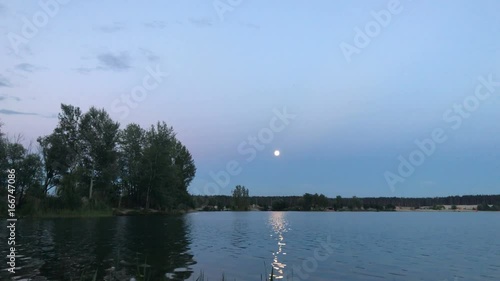 beautiful evening views of the Lake with the Moon photo