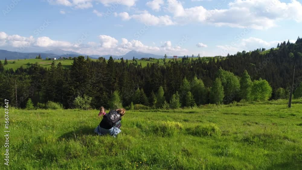 Photographer woman walking, spring day in forest Photographer woman walking, spring day in forest