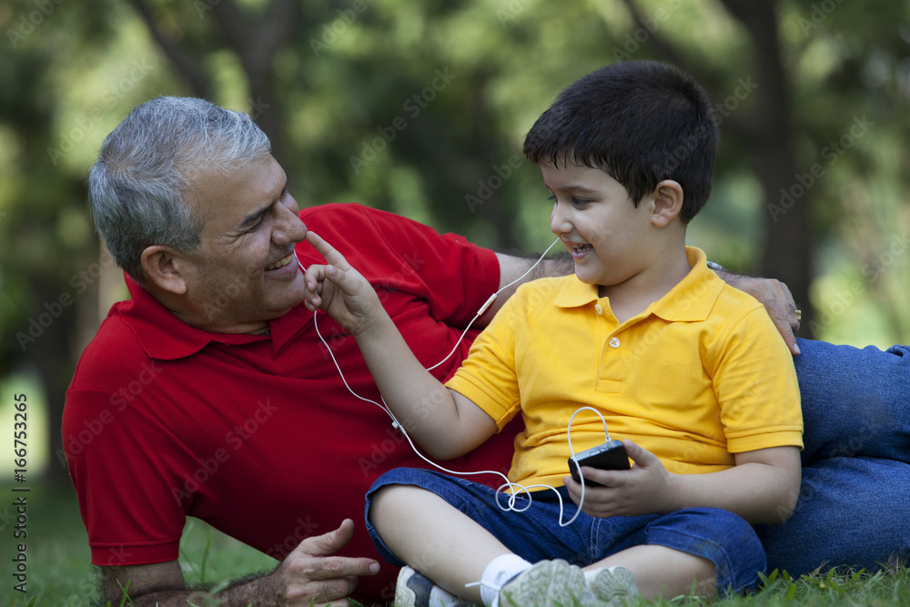© IndiaPix - Grandson touching his grandfathers nose © IndiaPix - Grandson touching his grandfathers nose