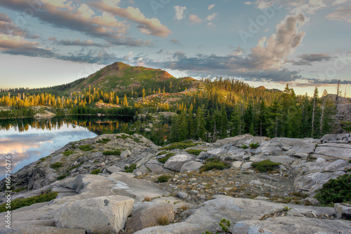 Fotografie Sunrise over the mountains surrounding Island Lake, South Lake Tahoe, California
