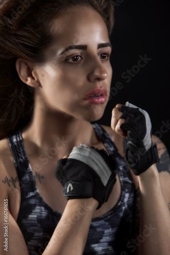 strong latina woman in boxing stance 