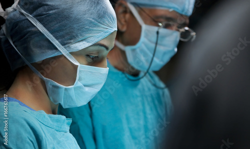 Surgeons in an operation theatre  photo