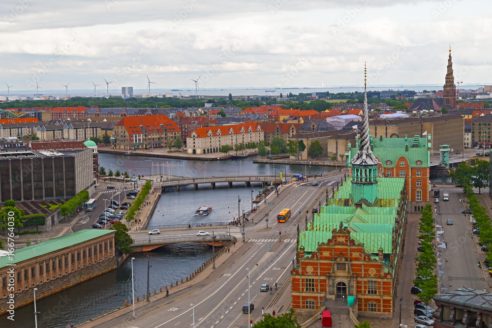 Waterfront city buildings along the canal in Copenhagen, Denmark. Copenhagen city panorama in summer, Denmark.