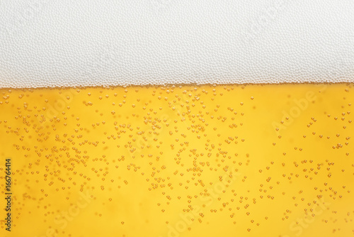 close up beer with foam and bubbles