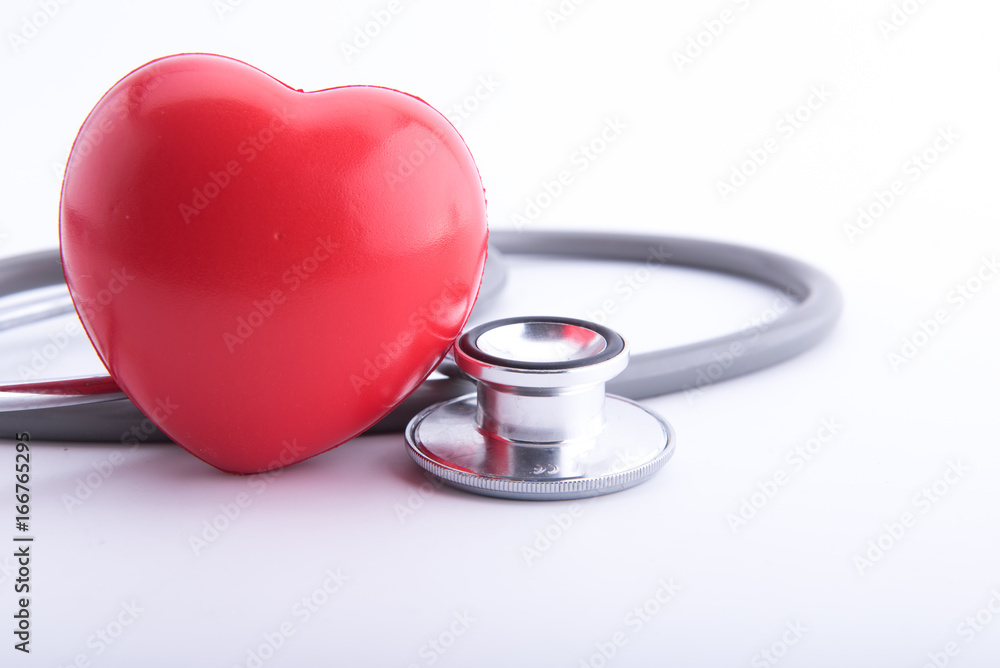 Red heart and a stethoscope isolated on white background Red heart and a stethoscope isolated on white background