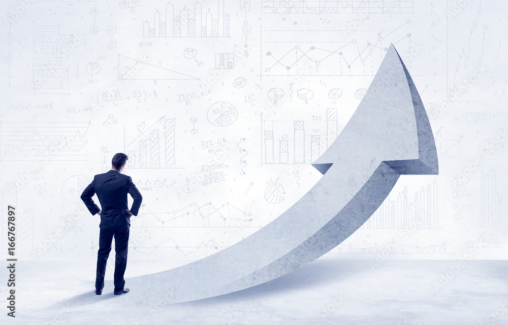 Obraz premium Financial businessman with arrow concept