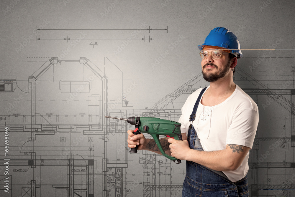 Worker with technical drawing. Worker with technical drawing.