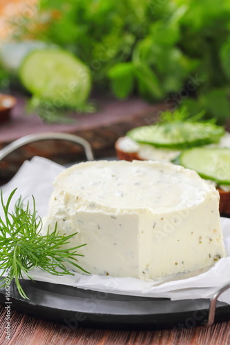 Canvas Print Delicious soft cheese with greens