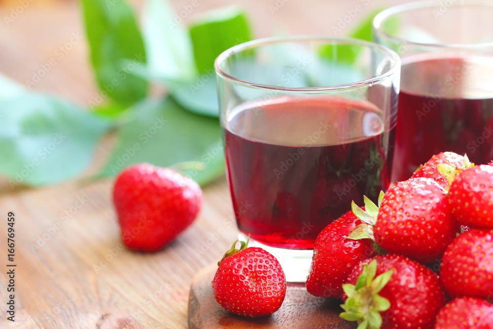 Cold strawberry juice and fresh berries Cold strawberry juice and fresh berries
