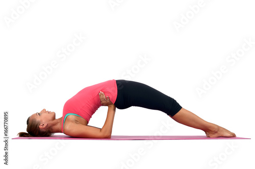 Fototapeta Naklejka Na Ścianę i Meble -  Young woman doing yoga