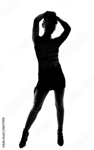 stylish silhouette of caucasian woman posin