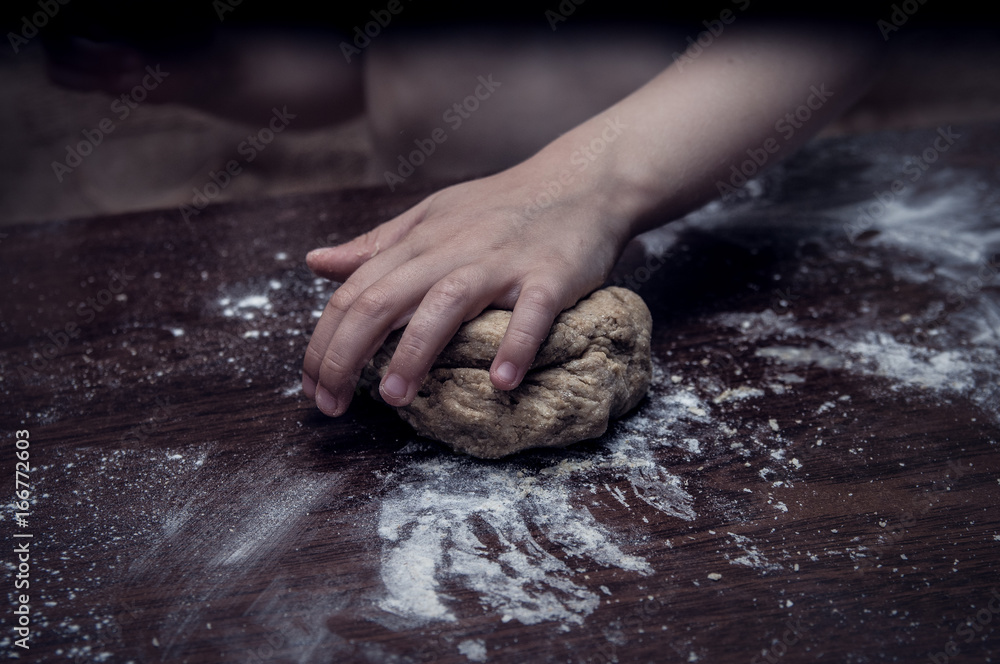 Hands skillfully knead the dough Hands skillfully knead the dough