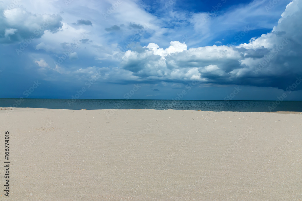 Sand and cloud sky on the beach.