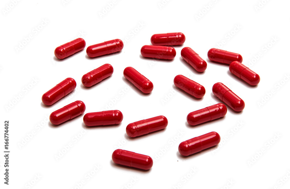 Red capsules isolated Red capsules isolated