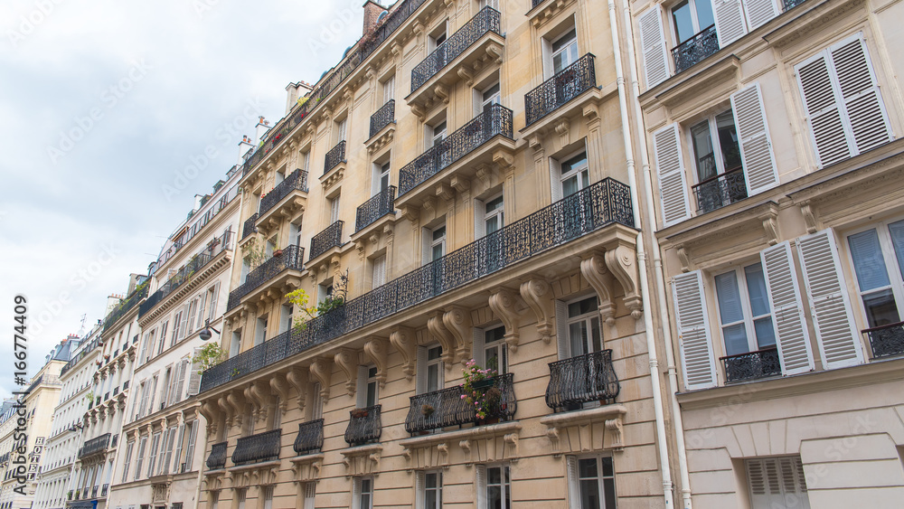      Paris, typical street in a stylish district with beautiful buildings 
