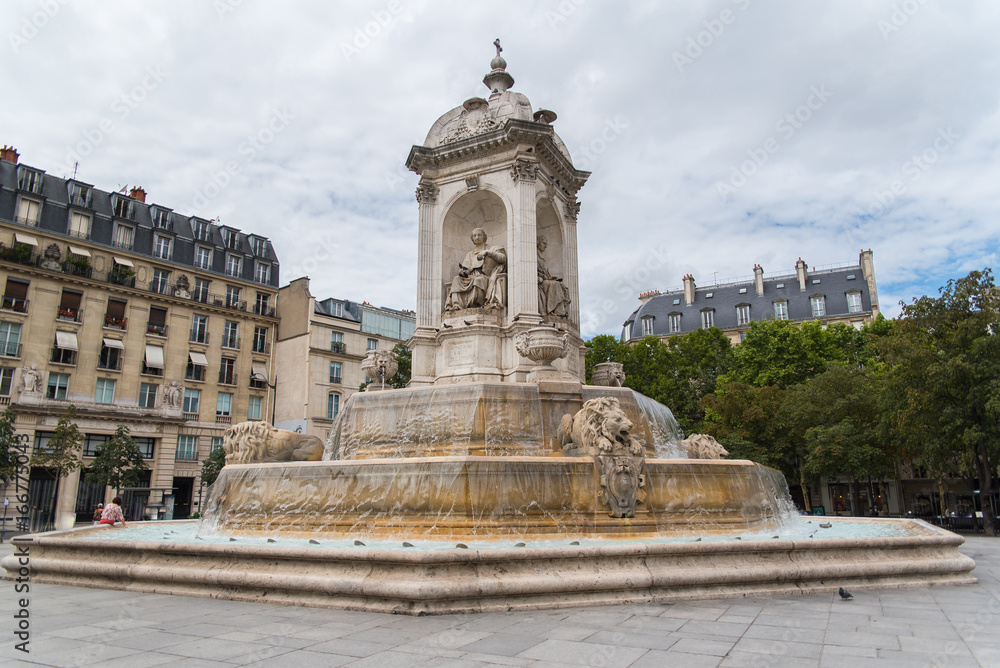 Paris, place Saint-Sulpice, the fountain with typical buildings in background
