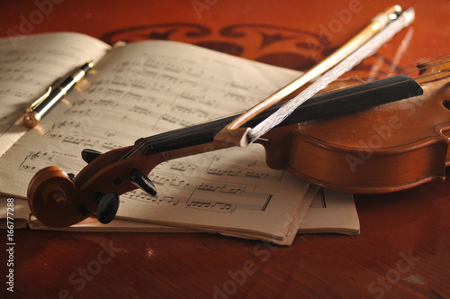 Violin and notes on the table