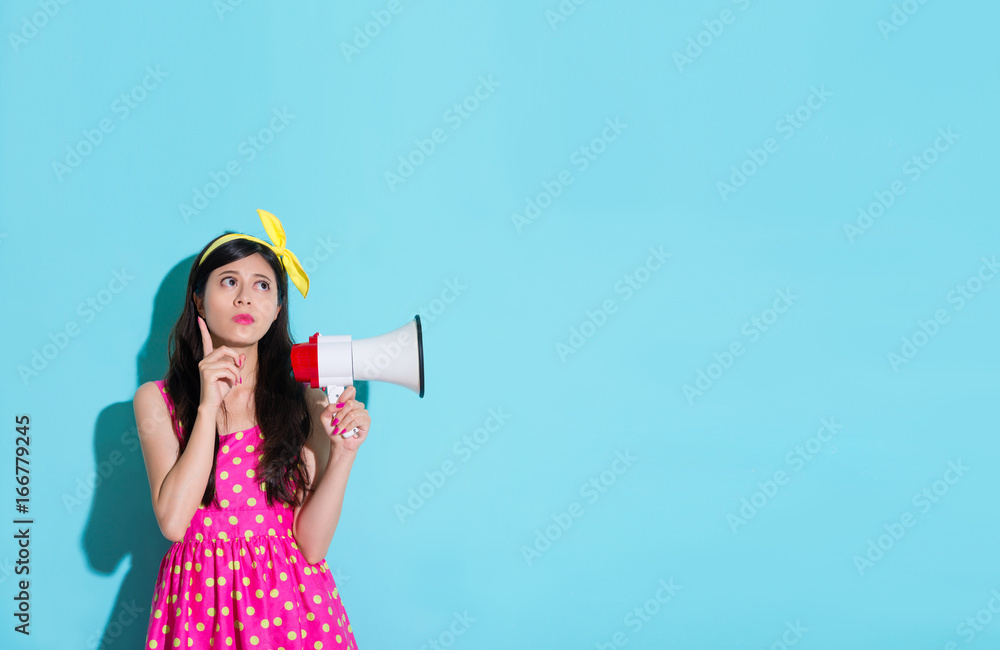 sweet elegant lady in blue background daydreaming sweet elegant lady in blue background daydreaming
