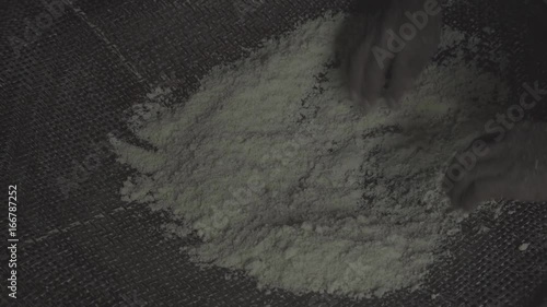 Sifting manioc flour