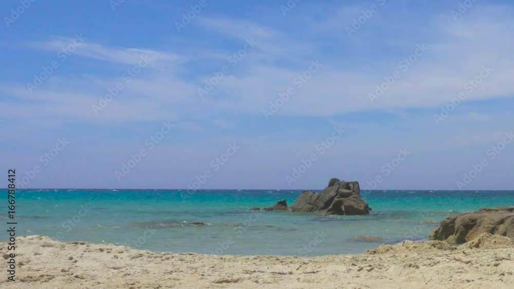 White Wild Mediterranean Sea Beach in Italy with Clear Blue Water White Wild Mediterranean Sea Beach in Italy with Clear Blue Water