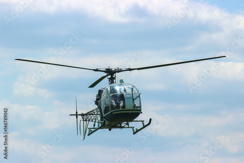 Fototapeta Naklejka Na Ścianę i Meble -  helicopter fly at the sky