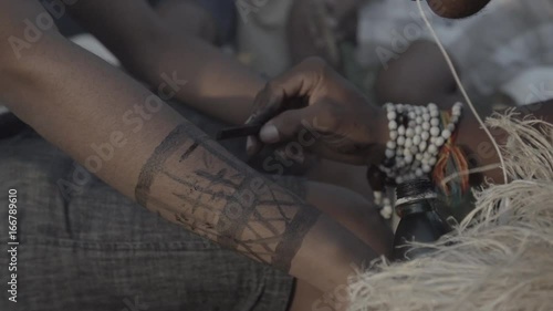 Indigenous painting on the arm
