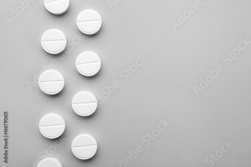 Fototapeta Naklejka Na Ścianę i Meble -  Health care concept. Pills on grey background