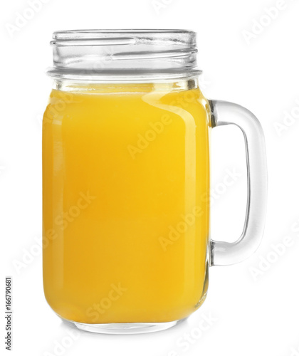 Mason jar of fresh orange juice on white background