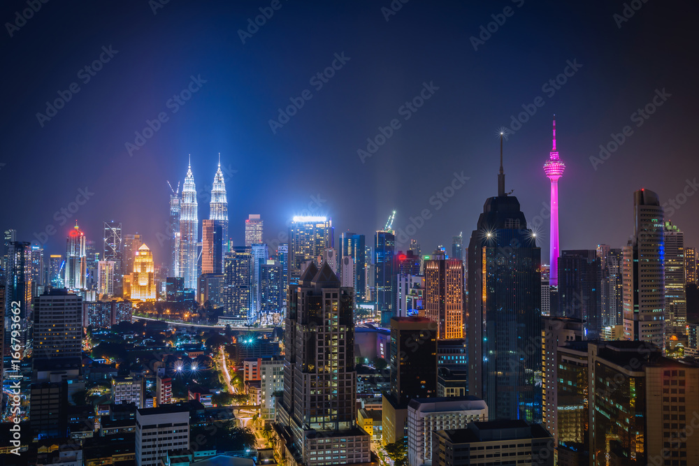 Fototapeta premium Cityscape of Kuala lumpur city skyline at night in Malaysia.