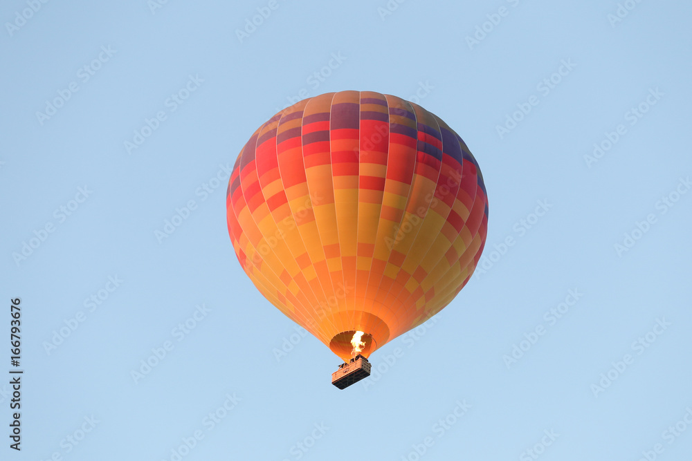 Naklejka premium Hot Air Balloon Over Goreme Town