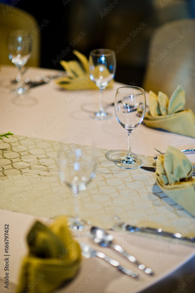 Fototapeta premium restaurant glass of water on table / dish and spoon