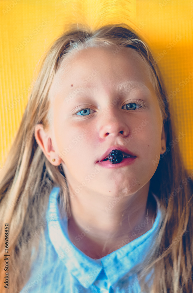Blackberry girl on her lips. Blackberry girl on her lips.