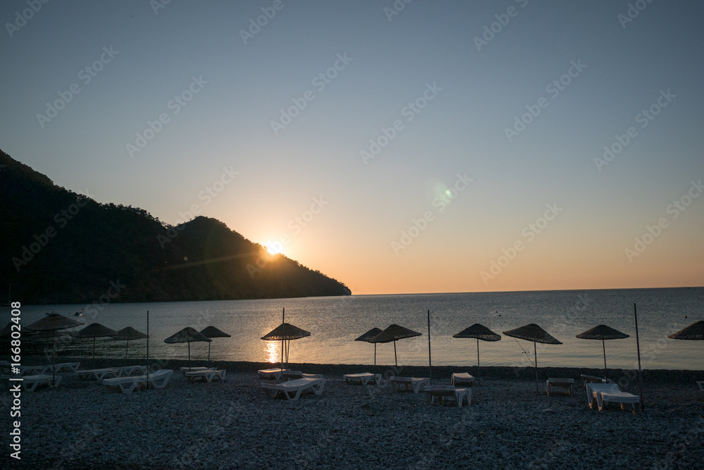 Sunrise silhouette on the beach Turkey Sunrise silhouette on the beach Turkey