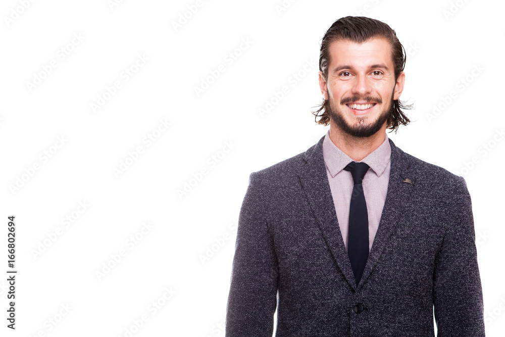Confident smiling businessman in formal wear isolated over white background in studio photo Confident smiling businessman in formal wear isolated over white background in studio photo