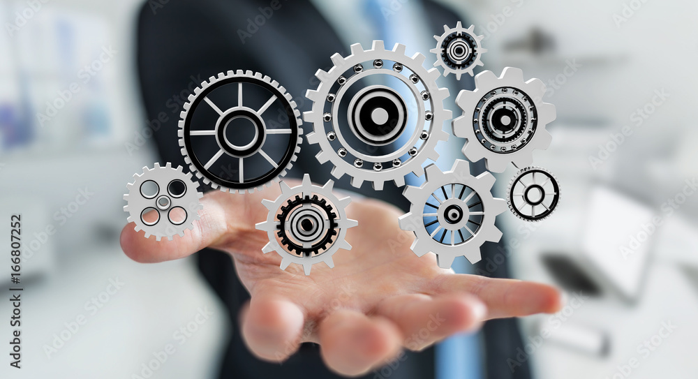 Businessman holding floating gear icons in his hand 3D rendering Businessman holding floating gear icons in his hand 3D rendering
