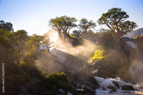 Misty sunrise on Epupa falls - Kunene river - Namibia - Angola border photo