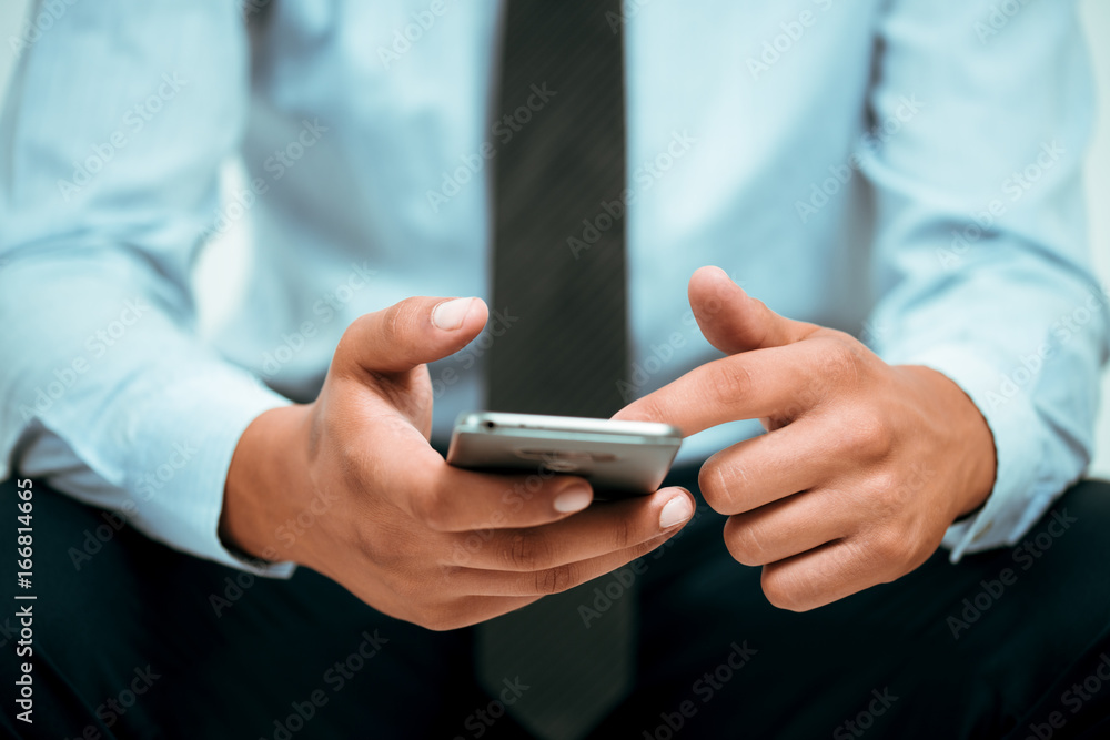 Businessman using smartphone Businessman using smartphone