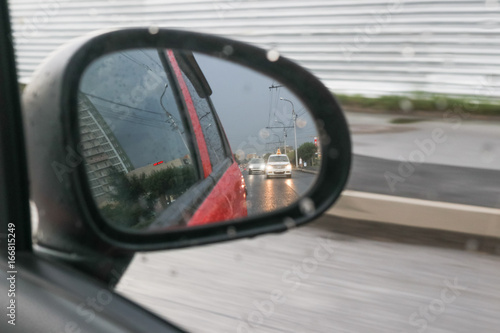 View in side mirror of car