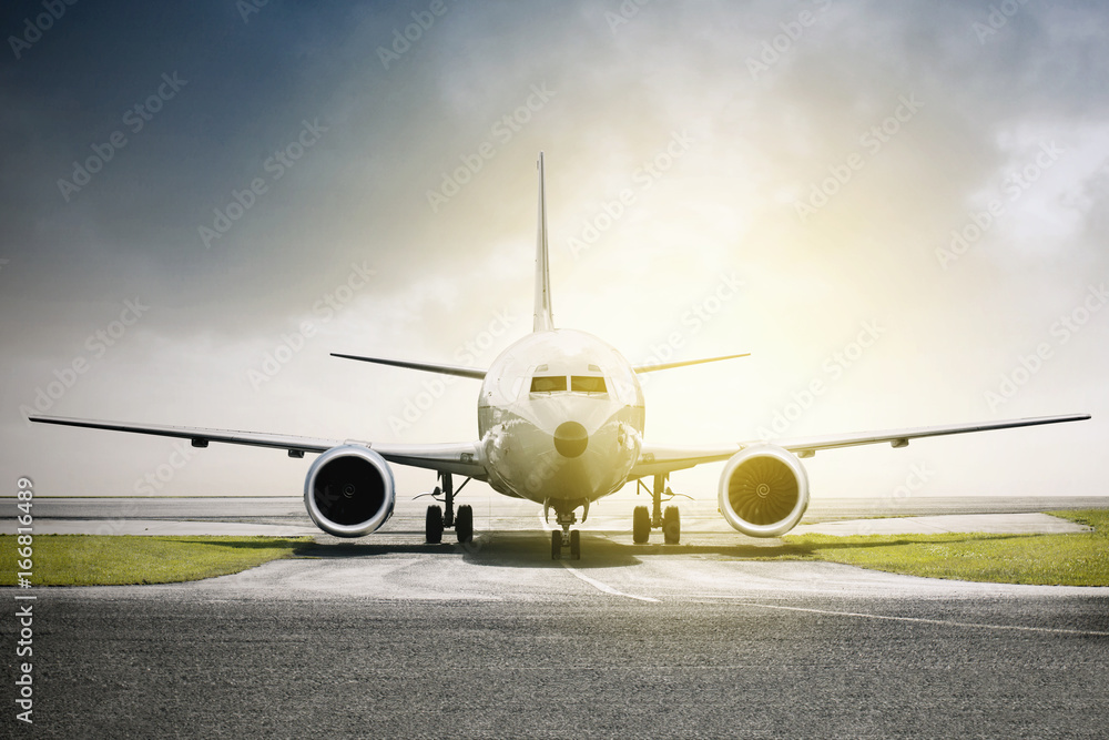 Fototapeta premium Airplane landing on the airport runway